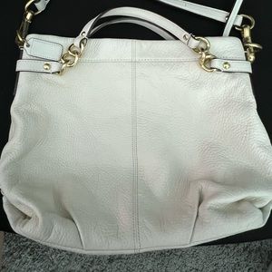 Ivory pebbled leather COACH bag with lavender lining and signature hardware NWOT